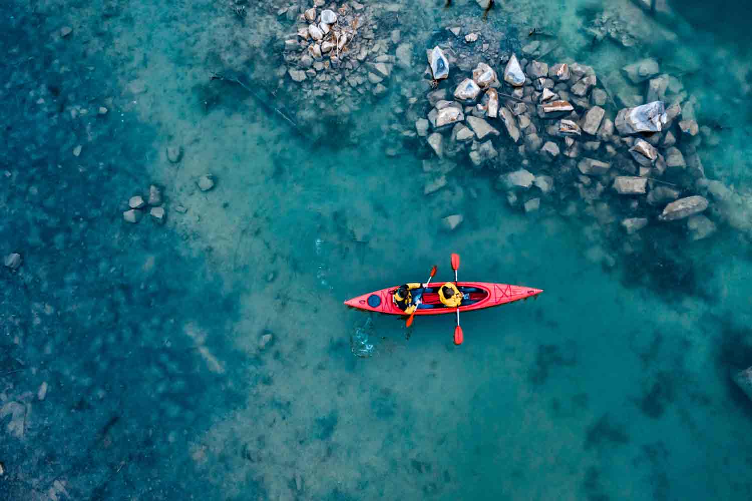 Gliding Through Glass: Kayaking Adventures on Crystal Water Rivers